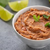 Beans · Our creamy, slow cook refried beans.
