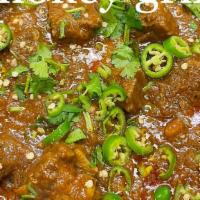 Goat Karahi  · Goat meat cook in special spices to make a delicious  stew/karahi