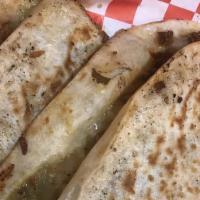 Quesadilla · Try the Cheesiest Quesadillas W/ choice of meat. Topped with fresh cilantro onions and salsa...