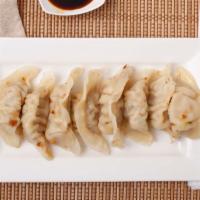 Dumpling · Choice of steam or fried chicken, vegetable dumpling, served with thin soy sauce.