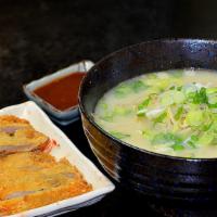 Chicken Katsu Ramen · Ramen noodles with bean sprouts, chicken katsu, half egg, green onions in salt sauce soup base