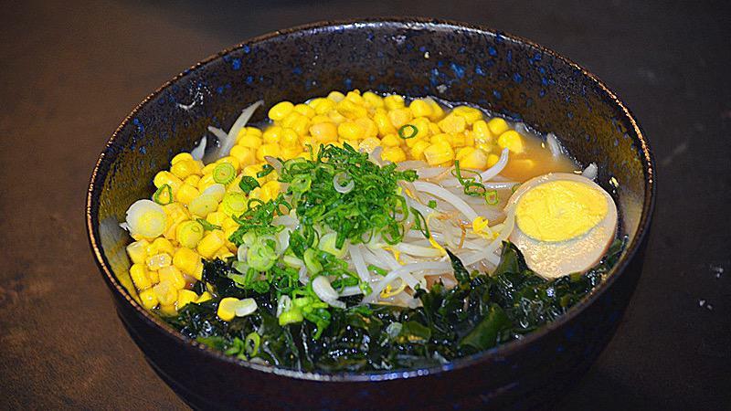 Wakame Ramen · Ramen noodles with bean sprouts, seaweed, corn, half egg, green onions in miso soup base