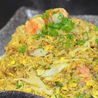  Curry Fried Rice · Fried rice make with shrimp, braised pork, cabbage,egg, coconut milk, curry powder and onions.