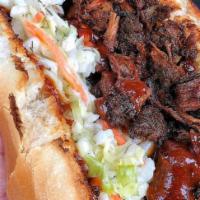 Bbq Brisket Sandwich · 1/3 lb slow-smoked Beef Brisket, BBQ sauce, Mozzarella Cheese, and a Tangy-Dill Coleslaw on ...