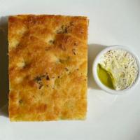 House Made Focaccia · toasted garlic + parmesan + butter