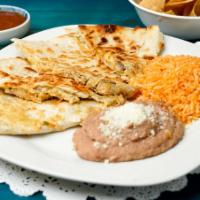 Quesadilla Mexicana (Lunch) · Vegetarian. A grilled flour tortilla, spread with refried beans, cheese, stuffed with beef t...