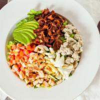 Cobb Salad · Choice of grilled chicken breast OR oven-roasted turkey breast, crumbled turkey bacon, hard-...