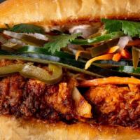 Bennett'S Banh Mi Sandwich · spicy fried chicken, pickled vegetables, sambal aioli, cucumber, cilantro, jalapeños
