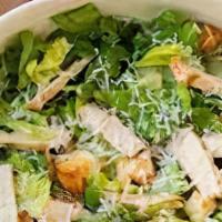 Chicken Caesar Salad · Romaine lettuce, croutons, shaved Parmesan cheese and chicken breast with Caesar dressing.