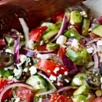 Greek Salad · Romaine lettuce, fresh tomato, Kalamata olives, cucumber, red onions, Garbanzo beans and fet...