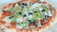 Lucia'S Combination Pizza · Pepperoni, sausage, bell pepper, olives, mushrooms, and onion.