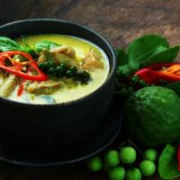 Green Curry · Delicious curry comes with coconut milk, bamboo shoots, green beans, bell peppers, and sweet...
