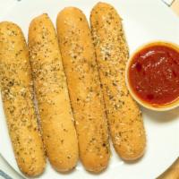 Italian Bread Stick Basket · Served with your choice of sauce.