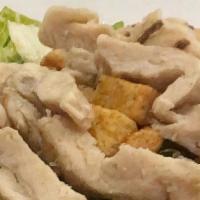 Chicken With Cream Sauce · Tender chicken pieces sautéed in our creamy Marsala sauce with basil & mushrooms, on a bed o...