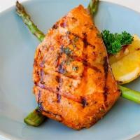Salmon · Norwegian salmon marinated overnight in paprika, lemon juice, parsley and garlic grilled to ...