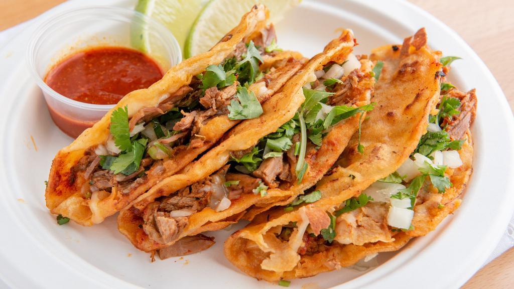 Quesabirria Taco (1) · With Mexican beef stew that is slow cooked until beef is tender and falls apart served on a corn tortilla, cilantro, onions, and salsa, that are dipped into the the stew and grilled until cheese is melted and tortilla nicely grilled.