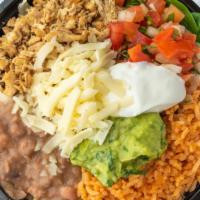 Meat Burrito Bowl · With Pico de gallo, cheese, sour cream, rice, refried beans, lettuce, guacamole, and your ch...