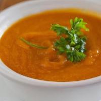 Carrot Ginger Soup · pureed carrots & onions spiced with fresh ginger, curry powder, lemon juice & parsley