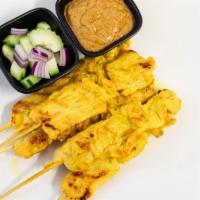 Chicken Satay · Grilled Marinated Sliced Chicken on Skewer. Serve with Peanut Sauce and Cucumber Salad.