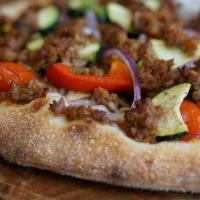 18 Inch Berkeley Vegan · Housemade marinara sauce, vegan daiya cheese, vegan crumbles, roasted zucchini, cherry tomat...