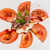 Beefsteak Tomato Salad · Burrata/prosciutto san Daniele/and Saba vinegar dressing