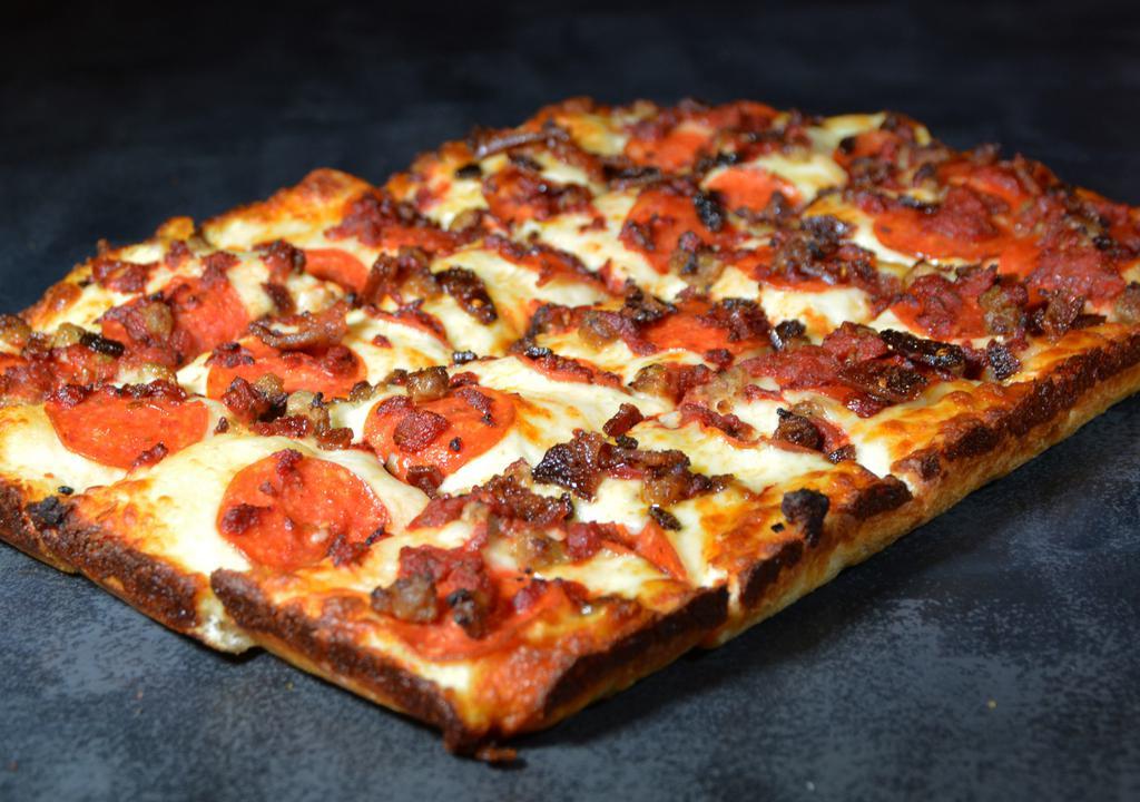 Meat Lovers Pizza · A carnivore's dream: pepperoni, sausage, and BOSS. bacon. Cali-Detroit style steel pan square cut pizza (10