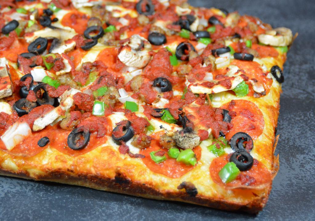 The Works Pizza · All the goods: pepperoni, sausage, bell peppers, onions, mushrooms, and olives. Cali-Detroit style steel pan square cut pizza (10