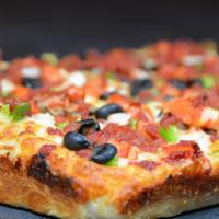 Veggie Delight Pizza · Produce gone wild: bell peppers, mushrooms, olives, tomatoes, and minced garlic. Cali-Detroi...