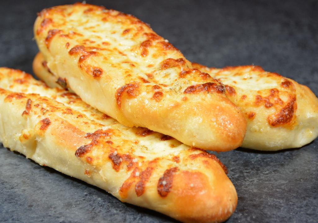 Italian Breadsticks  · Flavorful breadsticks with garlic butter, Italian herbs, mozzarella and parmesan cheeses.