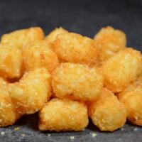 Seasoned Tater Tots · Lightly seasoned, completely tasty tater tots with choice of ketchup or spicy ketchup.