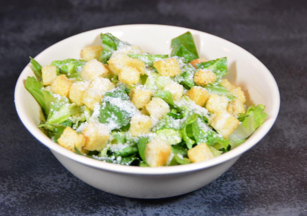 Caesar Salad · Classic Caesar salad with romaine lettuce, shredded parmesan, and crunchy croutons.