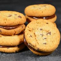 Chocolate Chip Cookie Sammies (5) · A layer of rich chocolate ganache in between two bite sized chocolate chip cookies. Includes...