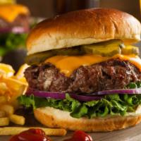 Cheeseburger · Charbroiled 6 oz. fresh chuck beef patty with house dressing, lettuce, tomato and American c...