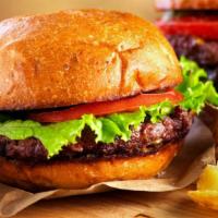Hamburger · Charbroiled 6 oz. fresh chuck beef patty with house dressing, lettuce and tomato.