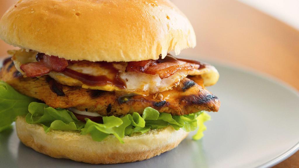 Chicken Ranch Club Sandwich · Charbroiled chicken breast with ranch dressing, lettuce, tomato and crispy bacon.