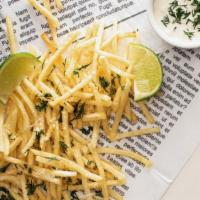 Garlic Fries · Fresh fried real skin-on potato fries with fresh garlic sauce.