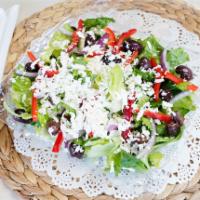 Greek Salad · Romaine lettuce, tomatoes, Greek olives, cucumber, red onions, red bell peppers, crumbled fe...