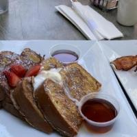 French Toast Combo · 2 slices of french toast, 3 eggs, 2 pieces of bacon & 2 sausages