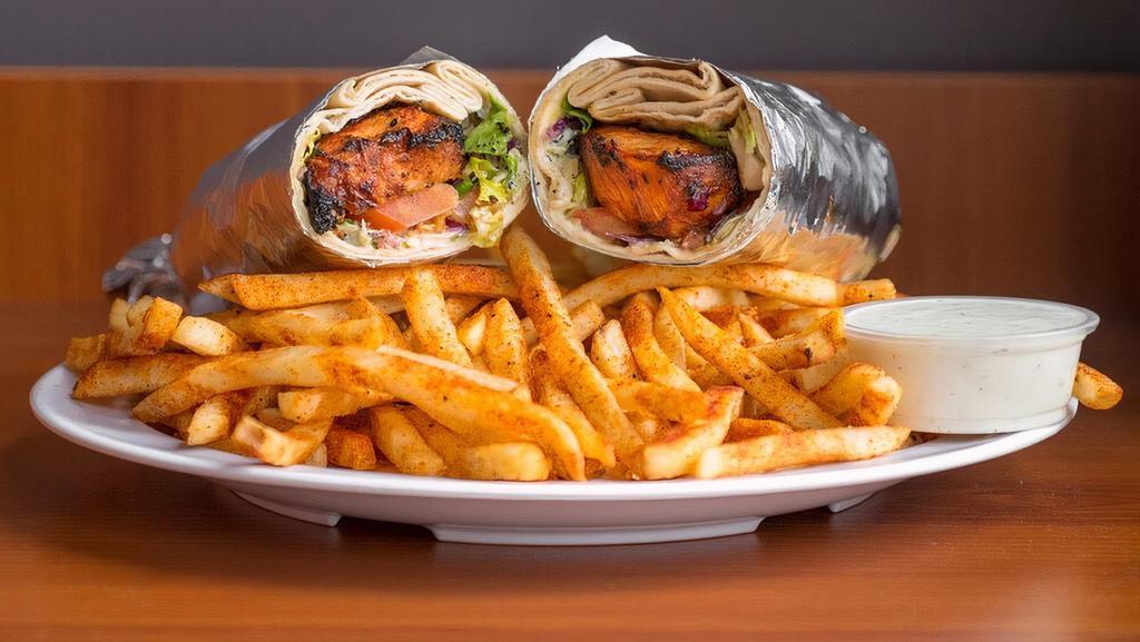 Chicken Kabob Wrap · White chicken breast. Our house marinated chicken breast grilled on skewers