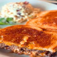 Patty Melt · Hamburger patty, American cheese, grilled onions, Thousand Island, grilled on rye bread.