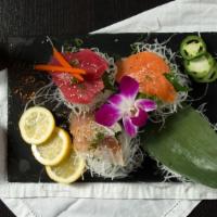 Sashimi Sampler · 2 pieces each of tuna, salmon, albacore sashimi
