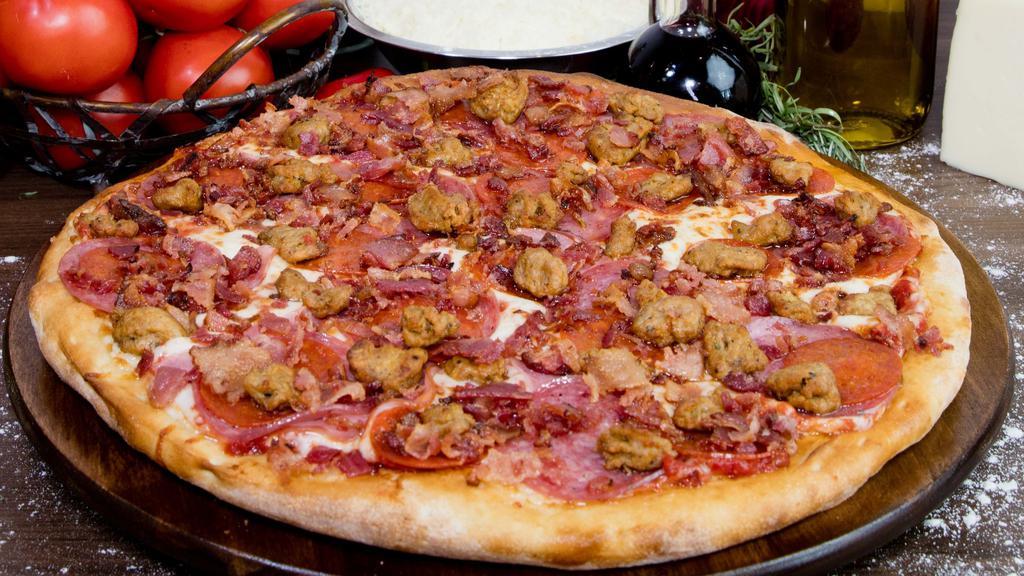 Meat Lovers Pizza · Red sauce, original crust, mozzarella cheese, pepperoni, salami, canadian bacon, applewood smoked bacon, & Italian sausage.