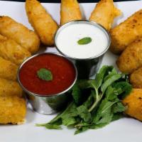 Sampler Platter (12Pc) · 4 mozzarella sticks, 4 creamy cheese poppers & 4 roasted jalapeno poppers.
