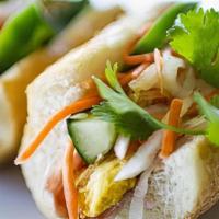 Banh Mi Breakfast · Vietnamese ham, eggs, cucumber, pork pate, house-made pickled daikon and carrots, jalapeno, ...