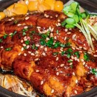 Unagi Donburi · glazed eel, dashi soy, cabbage, pickled daikon, green onion, chives, corn, sesame, wasabi
