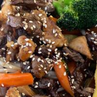 Teriyaki Trio Mix · onions, carrots, celery, squash, chop suey, and broccoli on a bed of white rice topped with ...