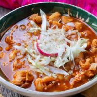 Pozole · Pork meat and hominy. Served with tortillas, cilantro, onion, and salsa.