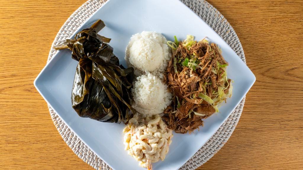 Kalua Pork With Cabbage And Lau Lau · Hawaiian style pulled pork, and authentic Hawaiian entree made with pork, fish, and taro leaves.