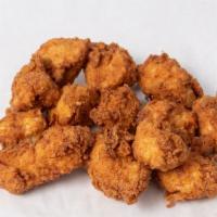 Jerk Chicken Tenders · Perfectly fried and juicy.
