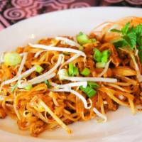 Pad Thai · Pan-fried rice noodles with egg, bean sprouts & topped with crushed peanuts.